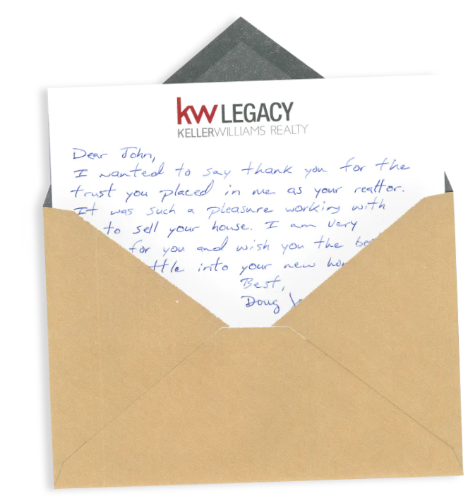 Handwritten card being pulled from envelope